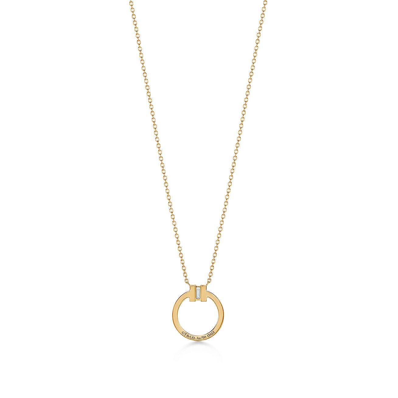 Tiffany T Diamond Pendant in 18k Gold with a Baguette Diamond